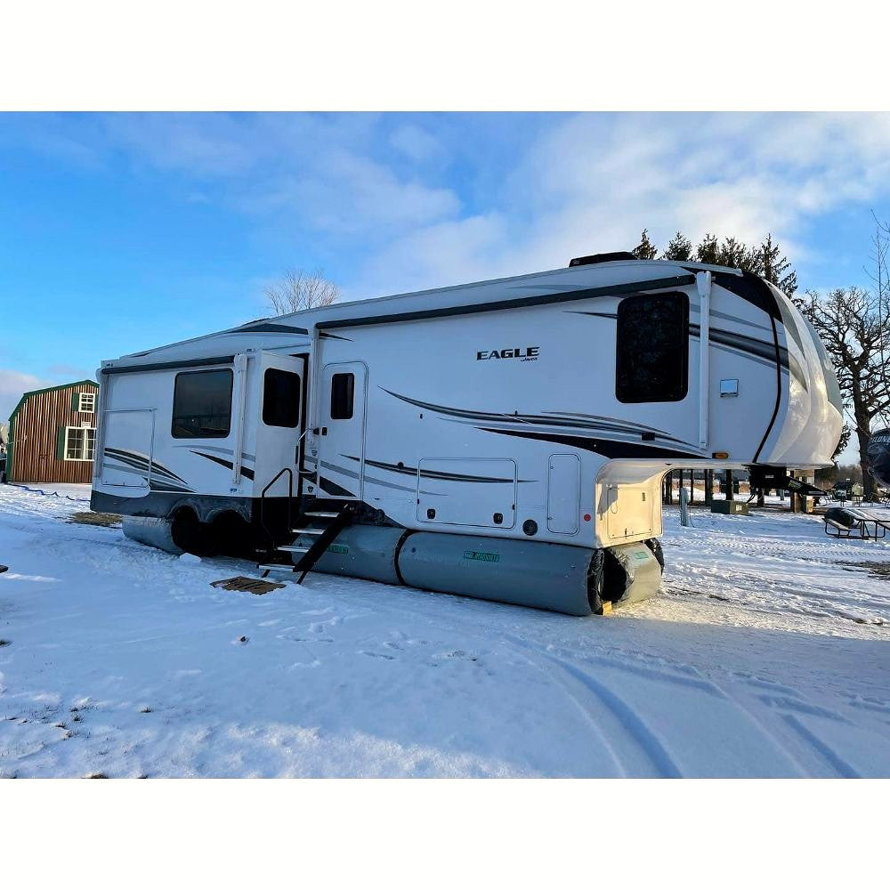 airskirts for rv small inflatable skirting kit for insulation eagle trailer in snow at sunset with tubes placed underneath corner view