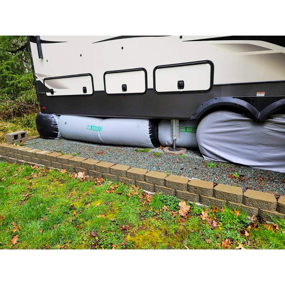 airskirts inflatable small rv skirt kit keystone trailer on rock foundation with tubes placed underneath the back corner