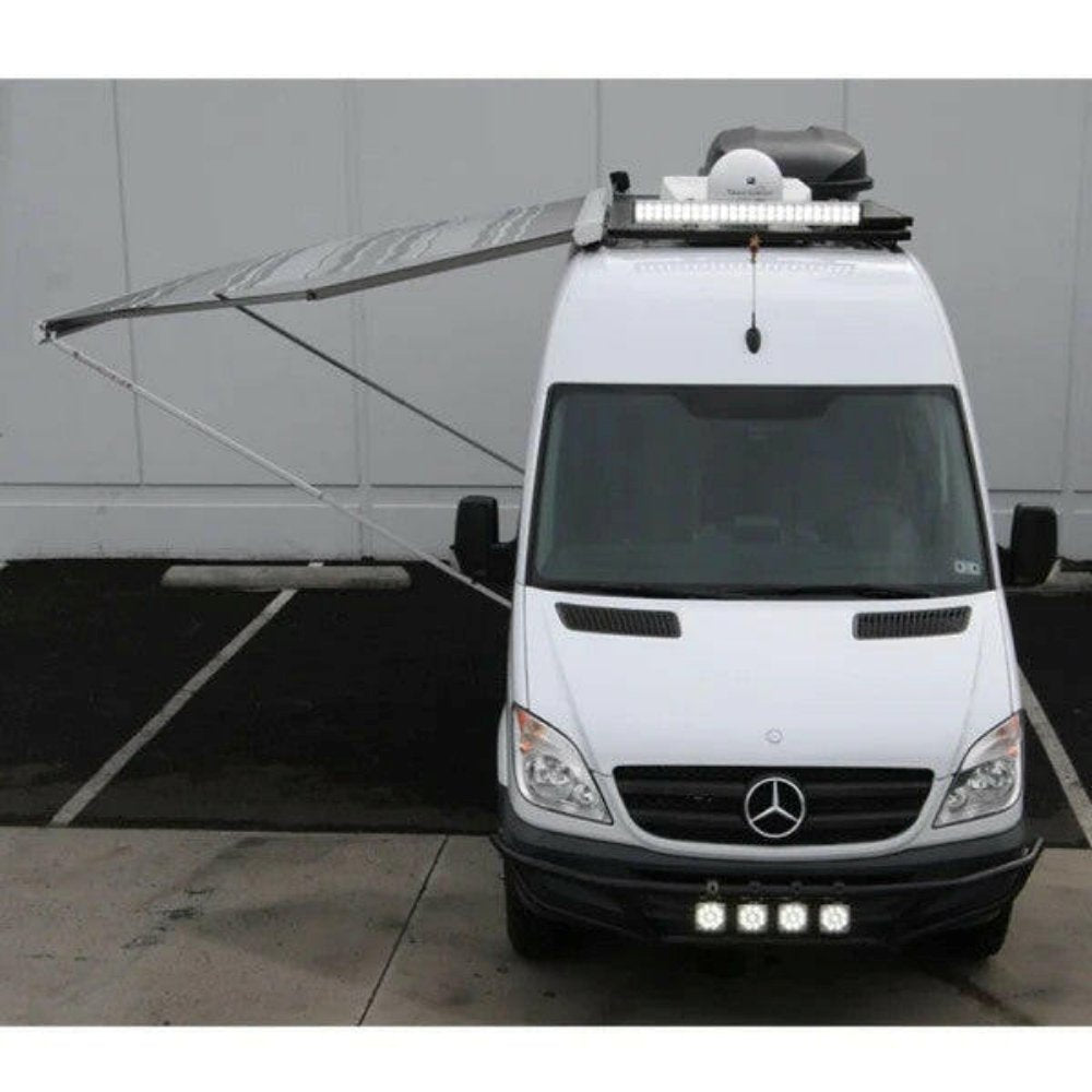 F80 Awning Extended image showing a white RV with the awning fully extended