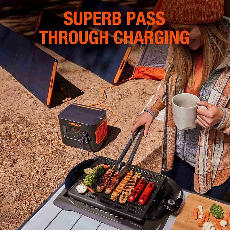 jackery 200 pro lifestyle image showing a person using an electric griddle to grill food outside