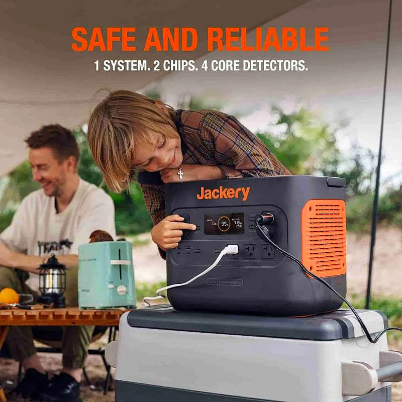 jackery 2000 watt image showing the power station sitting on a chest and a child pressing a button on it