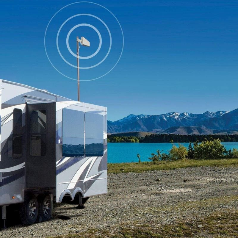 weBoost RV Destination Lifestyle Photo showing what the Outside Antenna attached to the Telescoping Pole looks like attached to an RV